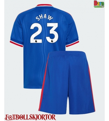 Manchester United Luke Shaw #23 Borta Kläder Barn 2026-27 Kortärmad (+ Korta byxor)
